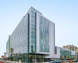 Glass building image of Sutter Health CPMC Van Ness campus in San Francisco.