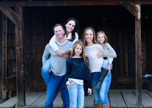 Scott Kidd with wife and three daughters.