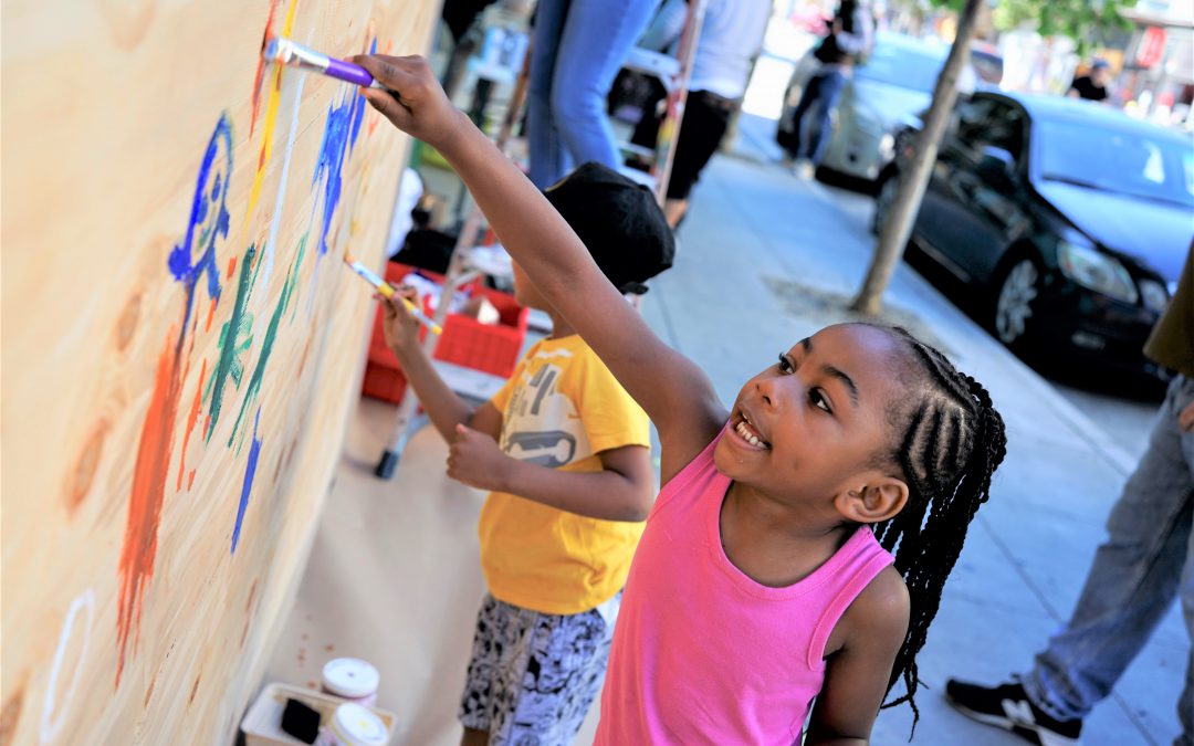 Art Out of Turmoil: Mission Care Center Converts Plywood into Community Murals