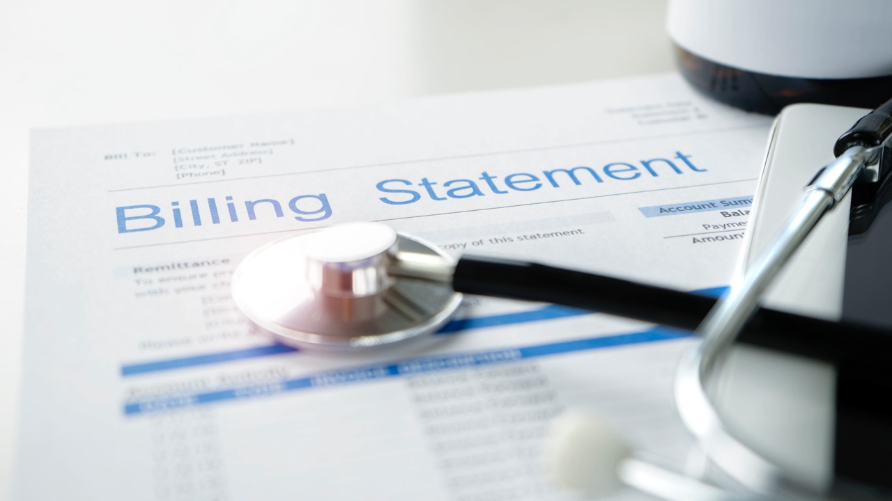 A hospital billing statement with a stethoscope