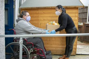 Delivering Food to the Disabled in Quarantine During Covid-19 Coronavirus Pandemic