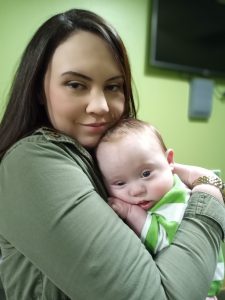 Mom holds baby