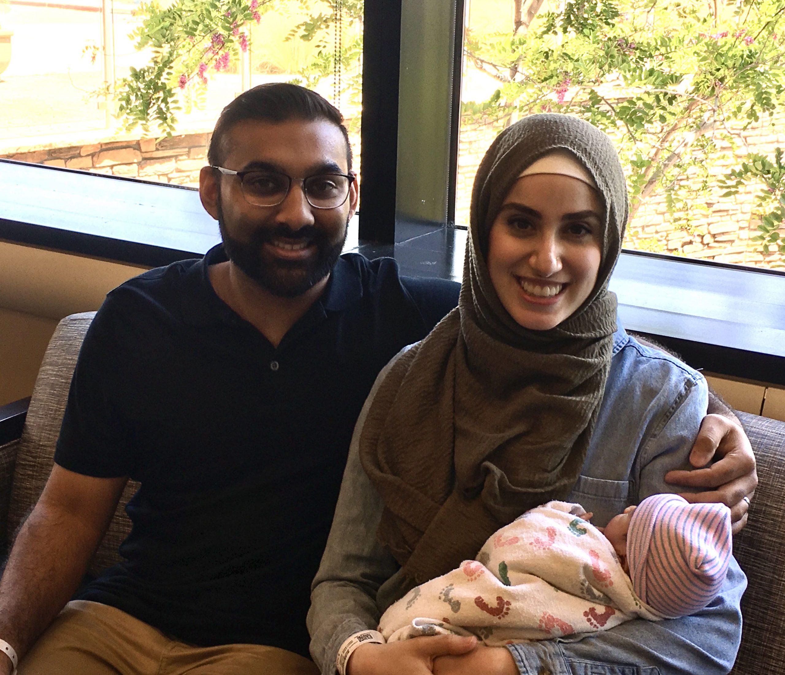Laila Mossadak and her husband, Akbar Moinuddin, and their new baby Zaid.