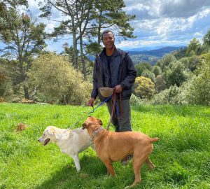 Dr. Willie Ross Walking his two dogs