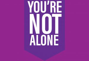 Suicide Prevention Month design concept featuring purple backgrounds and white text