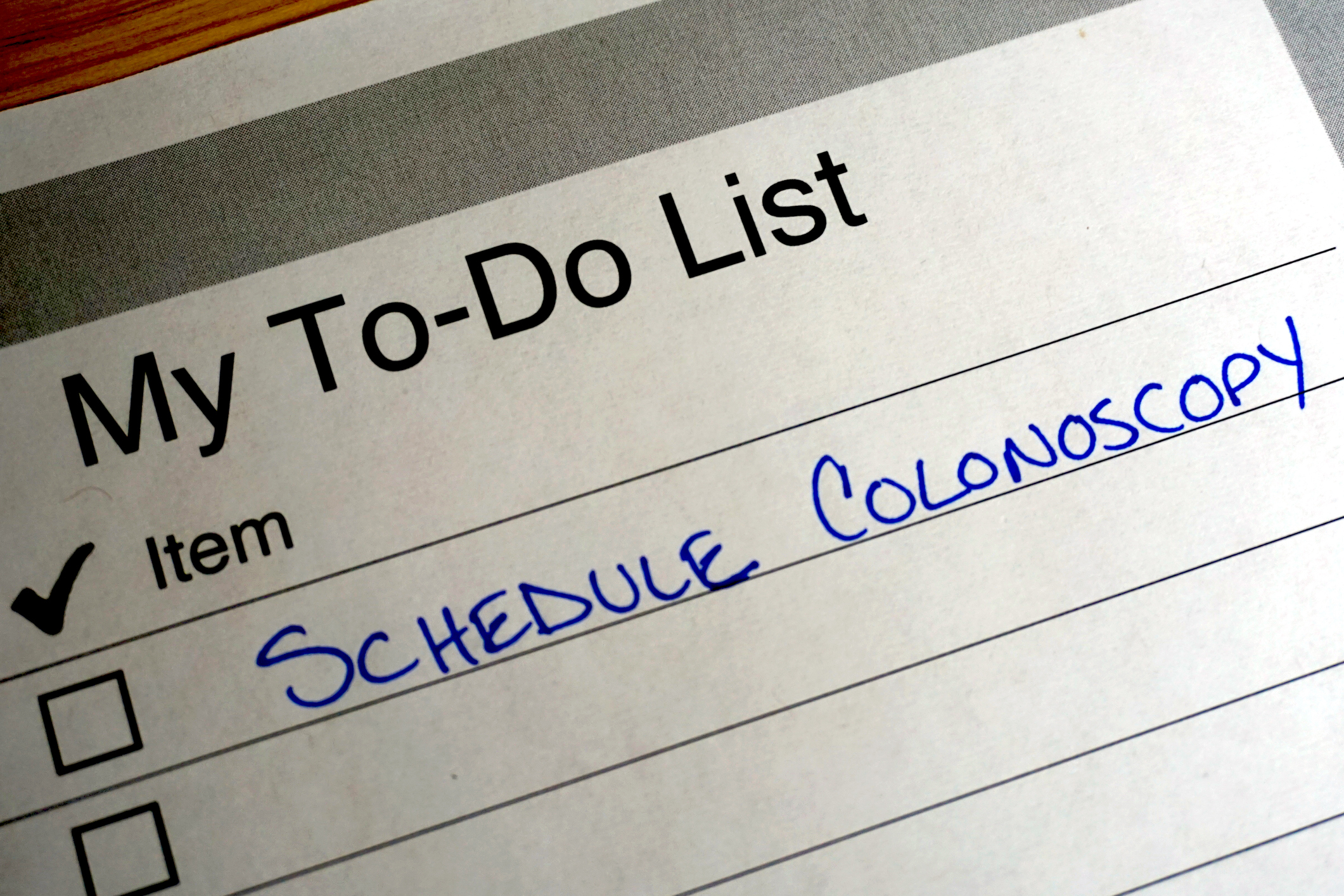 Reminder on to do list to schedule a colonoscopy stock photo