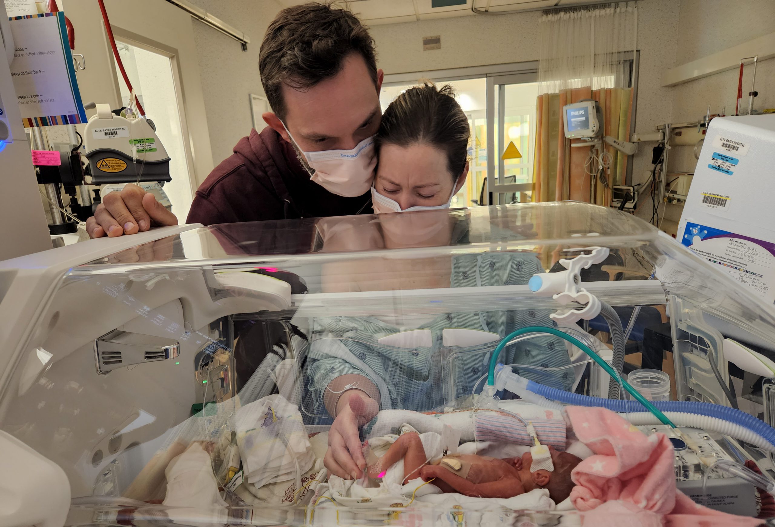 David and Tia Glover Visit Baby Daisy in NICU