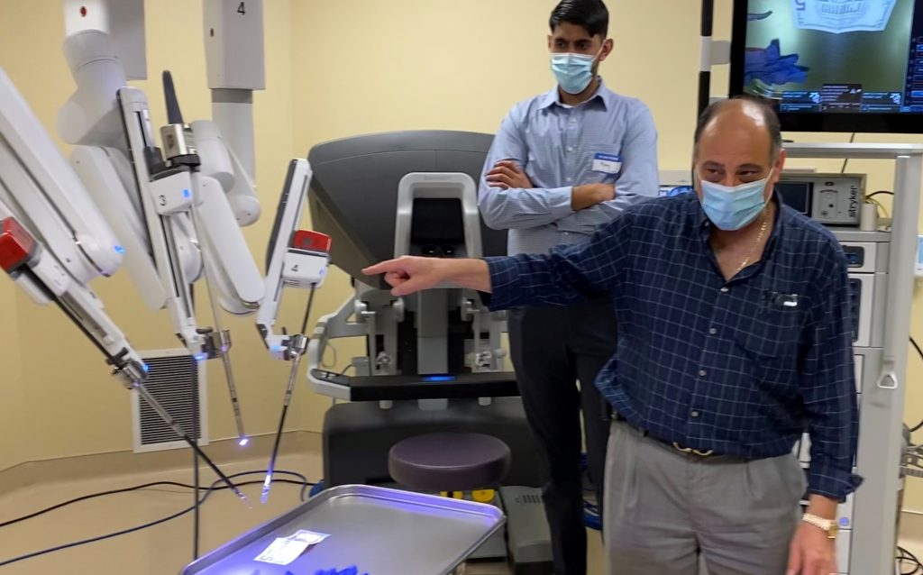 Dr. Ekdawy shows the da Vinci robot