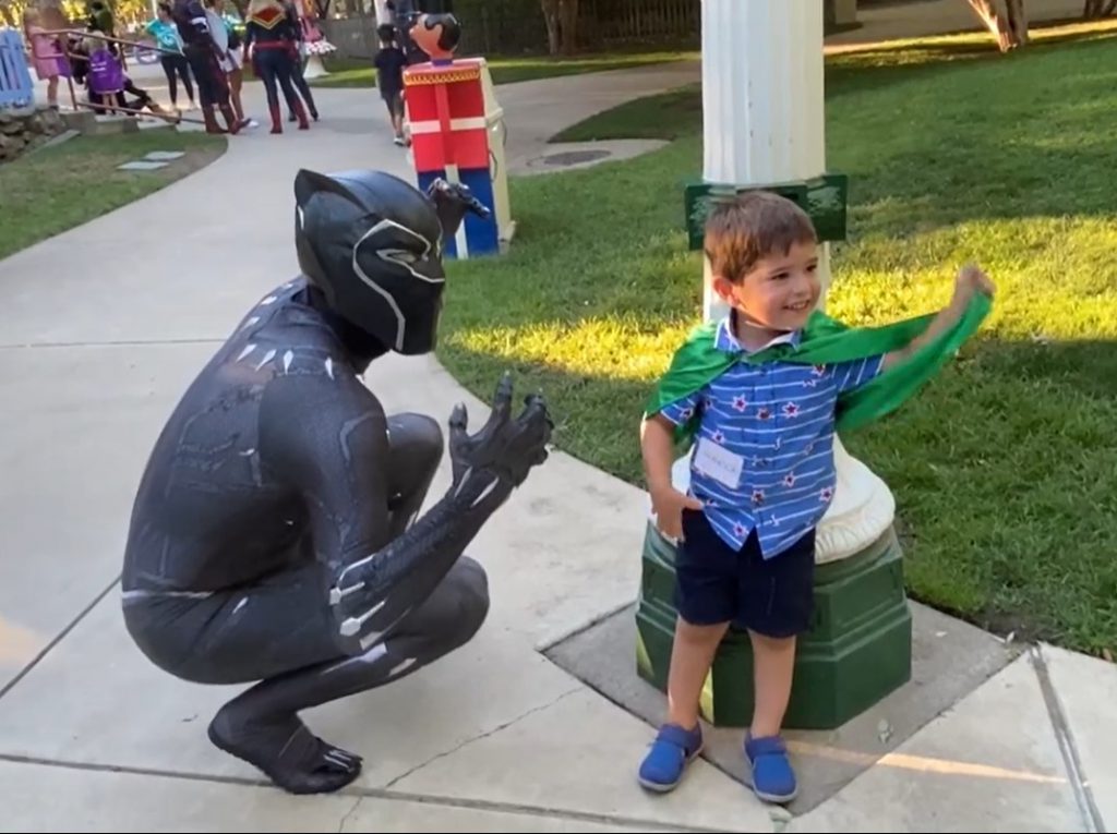 Superhero with child