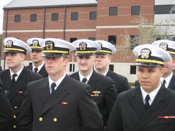 John Ready in uniform with other Navy officers.