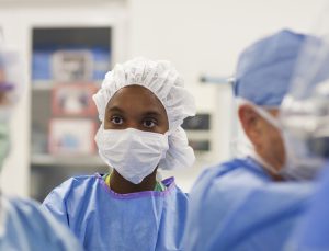 Black surgeon in operating room