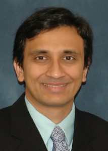 Dr. Soham Jhaveri, doctor in a suit.