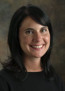 Professional photograph of Dr. Nobl Barazangi, a Caucasian woman with dark hair who is wearing a black blouse.