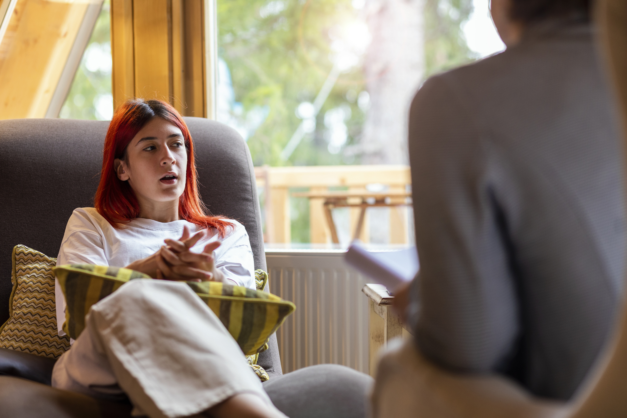 A young woman in a session with a psychologist