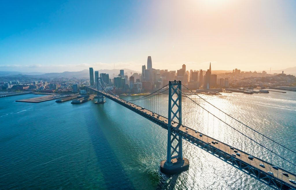Aerial view of Bay Bridge with San Francisco cityscape in the background