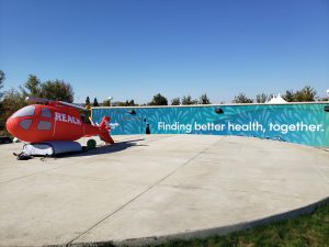 Five-foot inflatable medical helicopter sits as a demo on emergency medical services landing site outside of Sutter Davis Hospital's Emergency Department