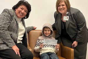 Boy donates to two hospital administrators.