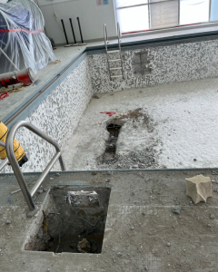 Photo of pool plaster removed.