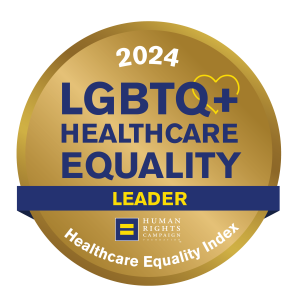 Graphic that looks like a gold coin and reads LGBTQ+ Healthcare Equality leader