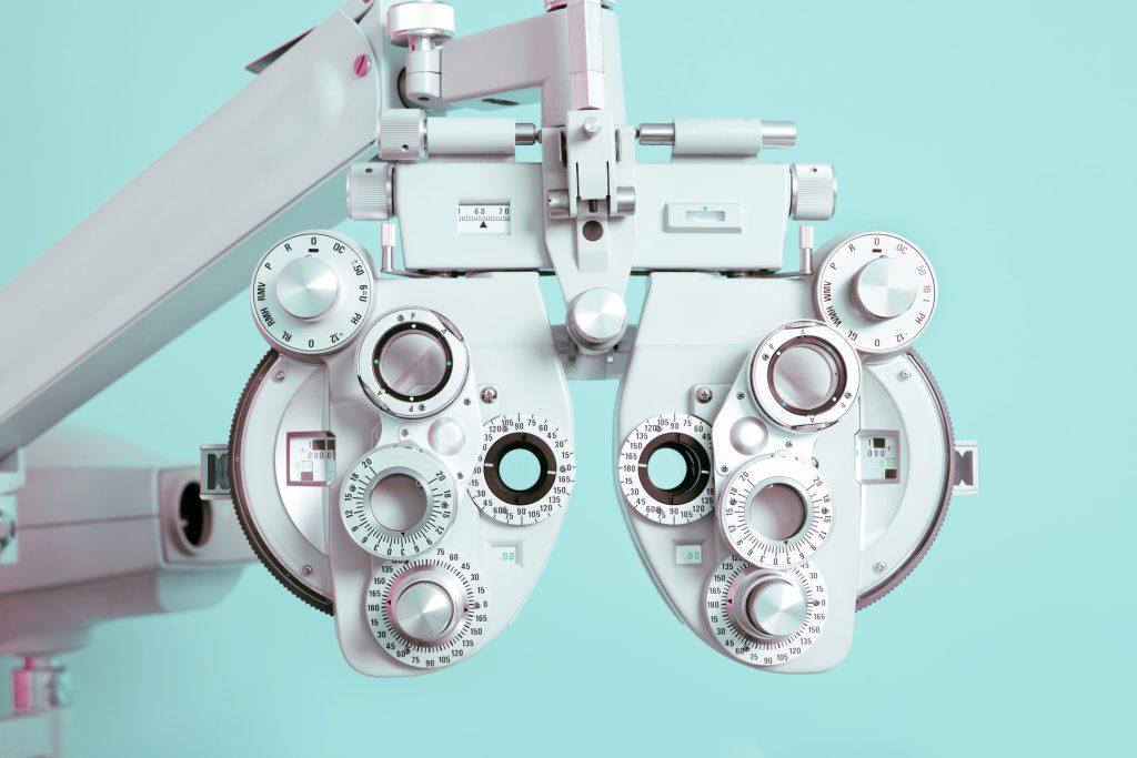 Close up of a phoroptor, an instrument used by eye care professionals during an eye examination.