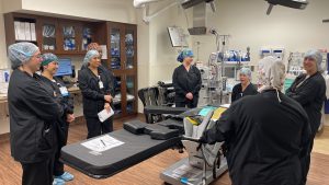 Numerous nurses gather inside operating room for training 