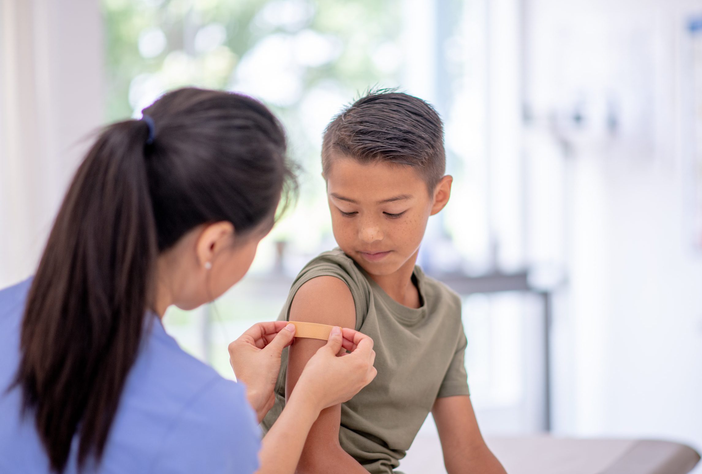 Boy receiving a vaccination