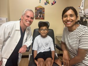 Portrait of Dr. Mark Silverberg, Ronin Zigler and Natasha Bhushan, Ronin's mom