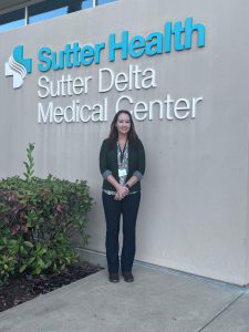 Portrait of Andrea Trimble in front of Sutter Delta Medical Center sign