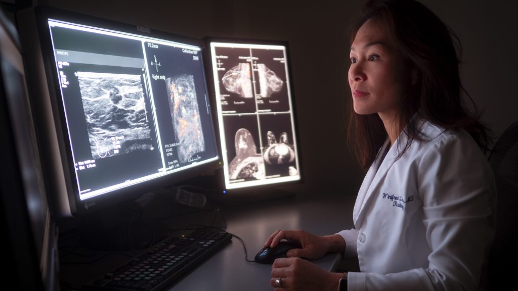 Dr. Winifed Leung looks at breast imaging scans.