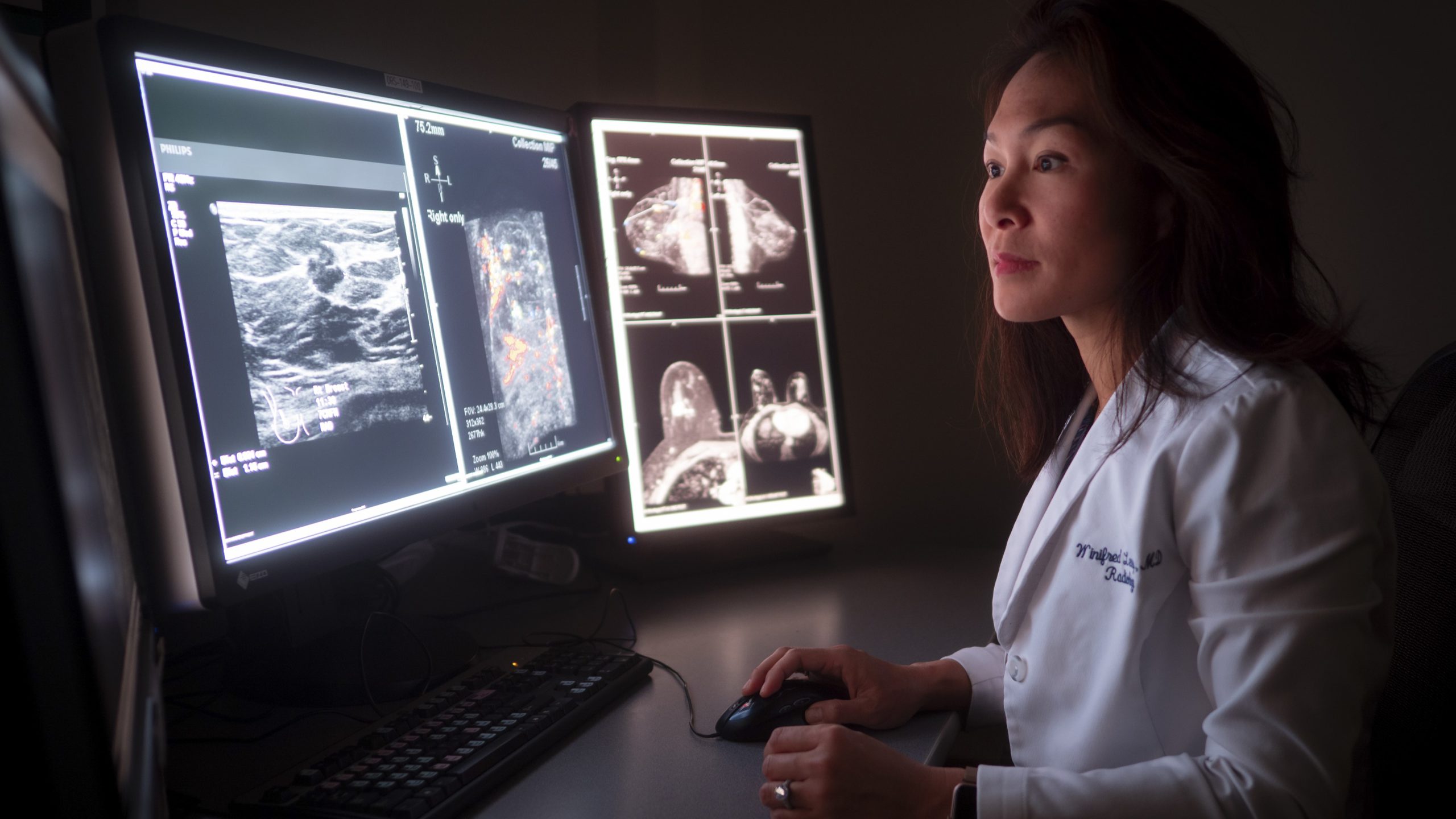 Dr. Winifed Leung looks at breast imaging scans.