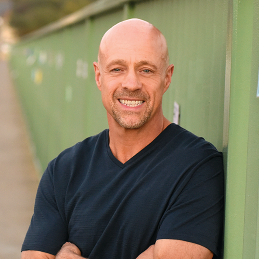 Man leaning against wall