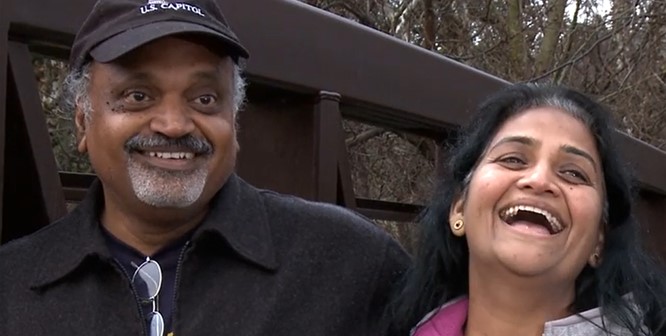 Sury Maturi, a father and husband, and his wife smiling.