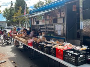 West Valley Community Services’ Park-It Market, a bright blue customized food truck that’s feeding those in need. 