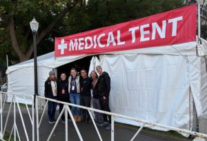 Sutter Health team members in front of medical tent.