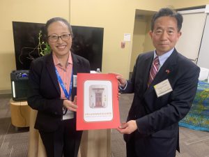 Dr. Amy Matecki (left) was presented with a proclamation from Pengfei Gao, Counselor of the SF Consulate General of the People's Republic of China.