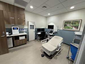 A view of a new medical exam room with equipment ready for service.