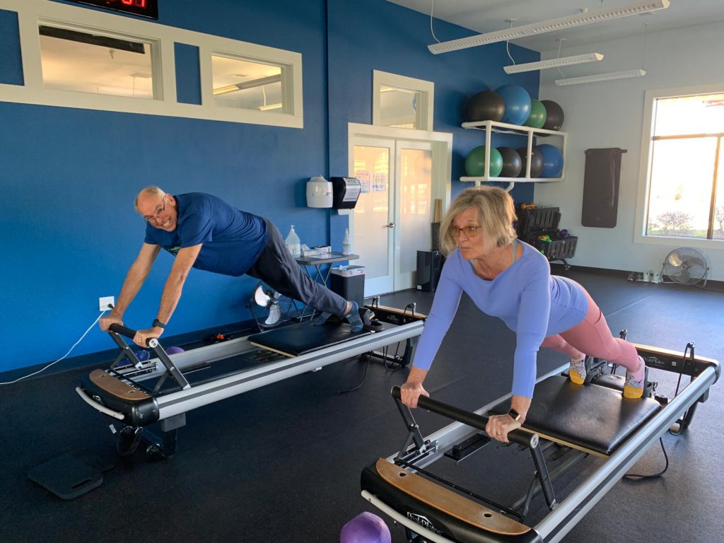 Linda and her husband her demonstrate their dedication to Reformer Pilates.