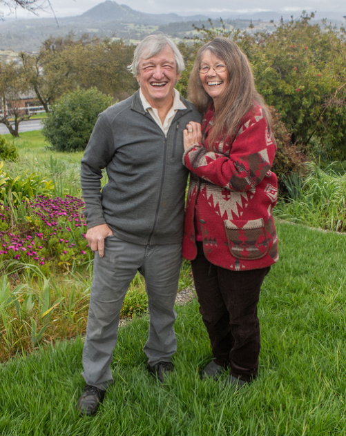 Couple standing on their property