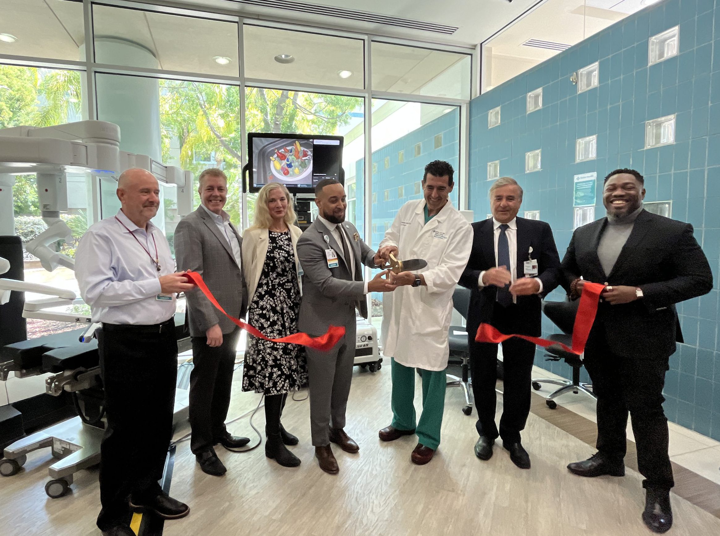 Sutter leaders and physicians cut a ribbon in celebration of the da Vinci 5 surgical robot's debut at Sutter Delta Medical Center in Antioch, Calif.
