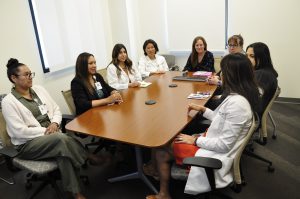 members of the High-Risk Breast Clinic meeting around a table at Ridley-Tree Cancer Center