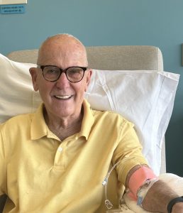Man receiving an infusion of an Alzheimer's drug
