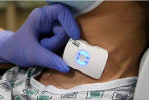 FloPatch, a wearable Doppler ultrasound device, is applied to the neck to measure real-time blood flow and help clinicians make faster, more personalized treatment decisions.