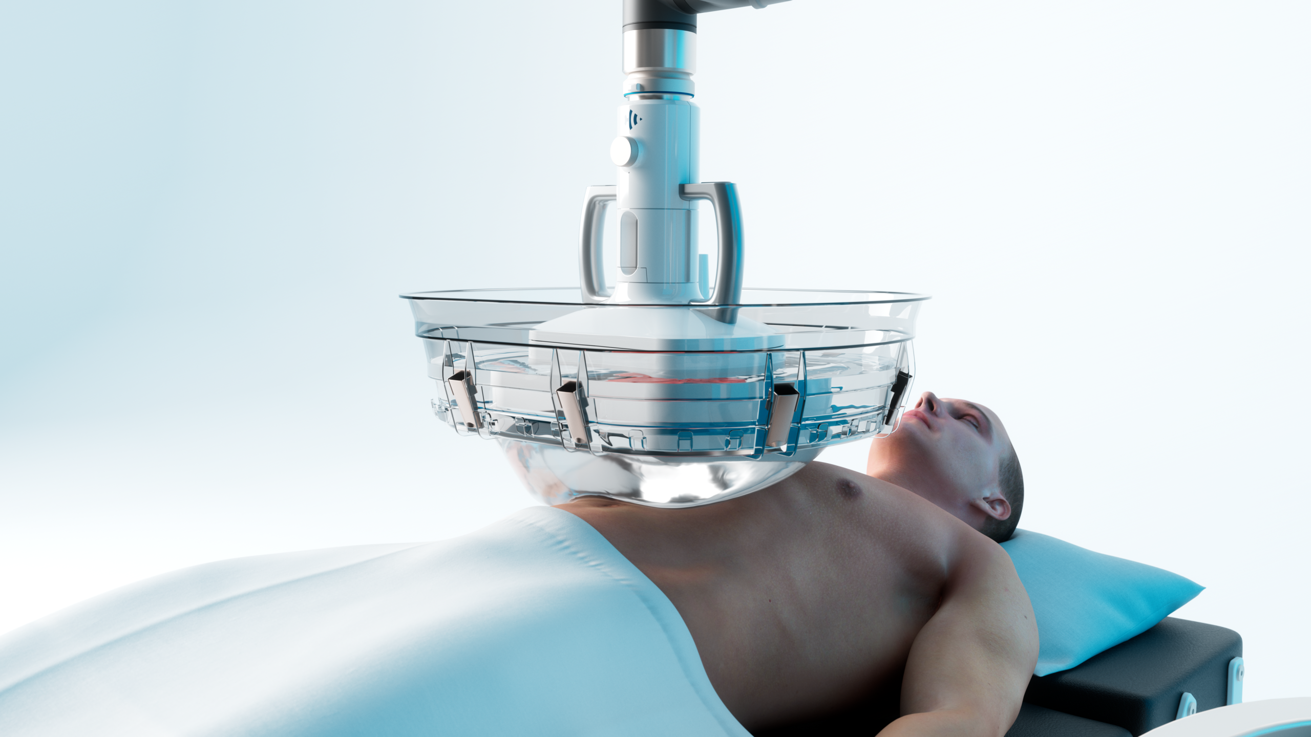 A robotic arm hovering over Caucasian man's torso while he lies on a operating room table