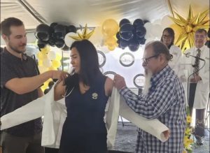 Med student, white coat ceremony