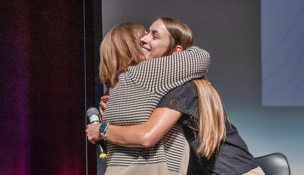 Sierra Cartrell hugging Sutter Roseville CEO Tammy Powers at Summit