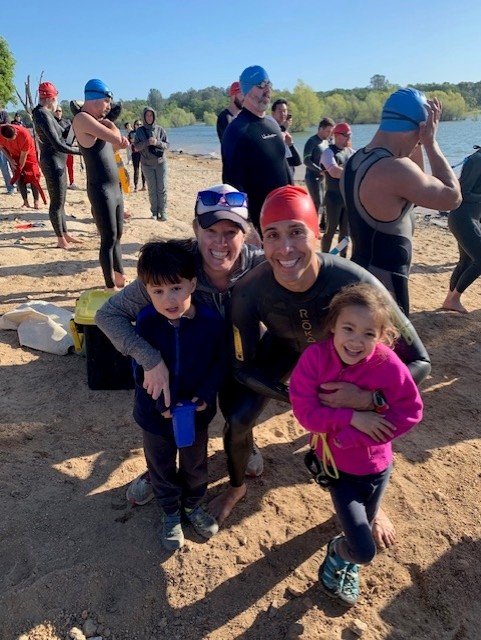 Dr. Adrian Tabares and his family share a smile following a competition.