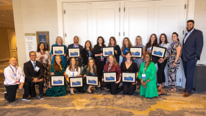 Reps from Sutter holding ASC Excellence Awards