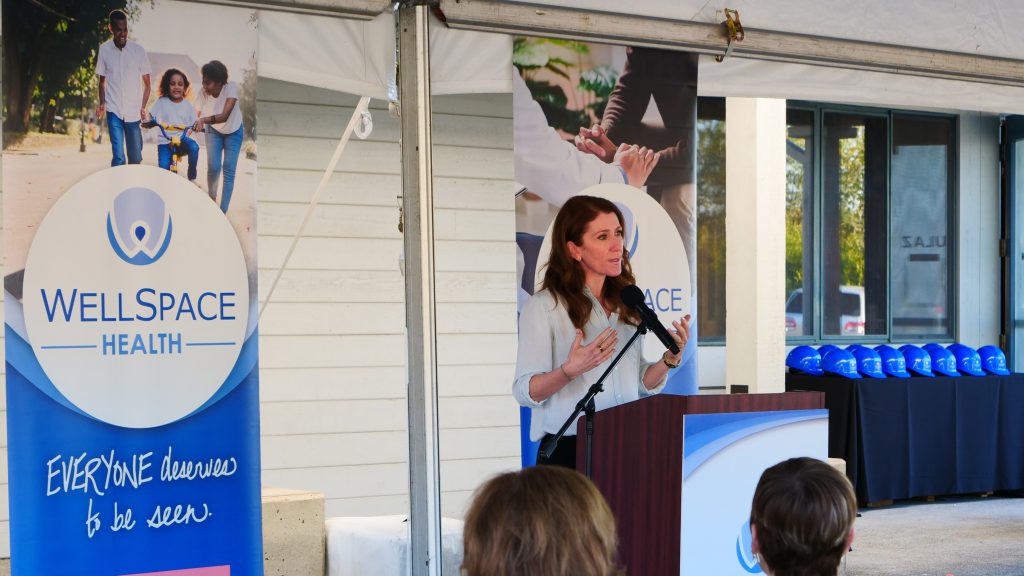 Woman at podium