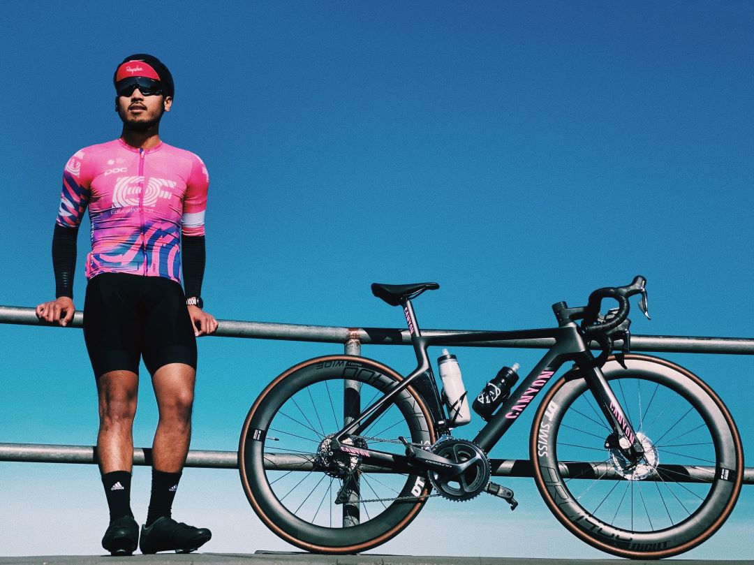Rond Allen poses next to his bike before a ride.