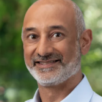 Headshot of a male doctor in a button up